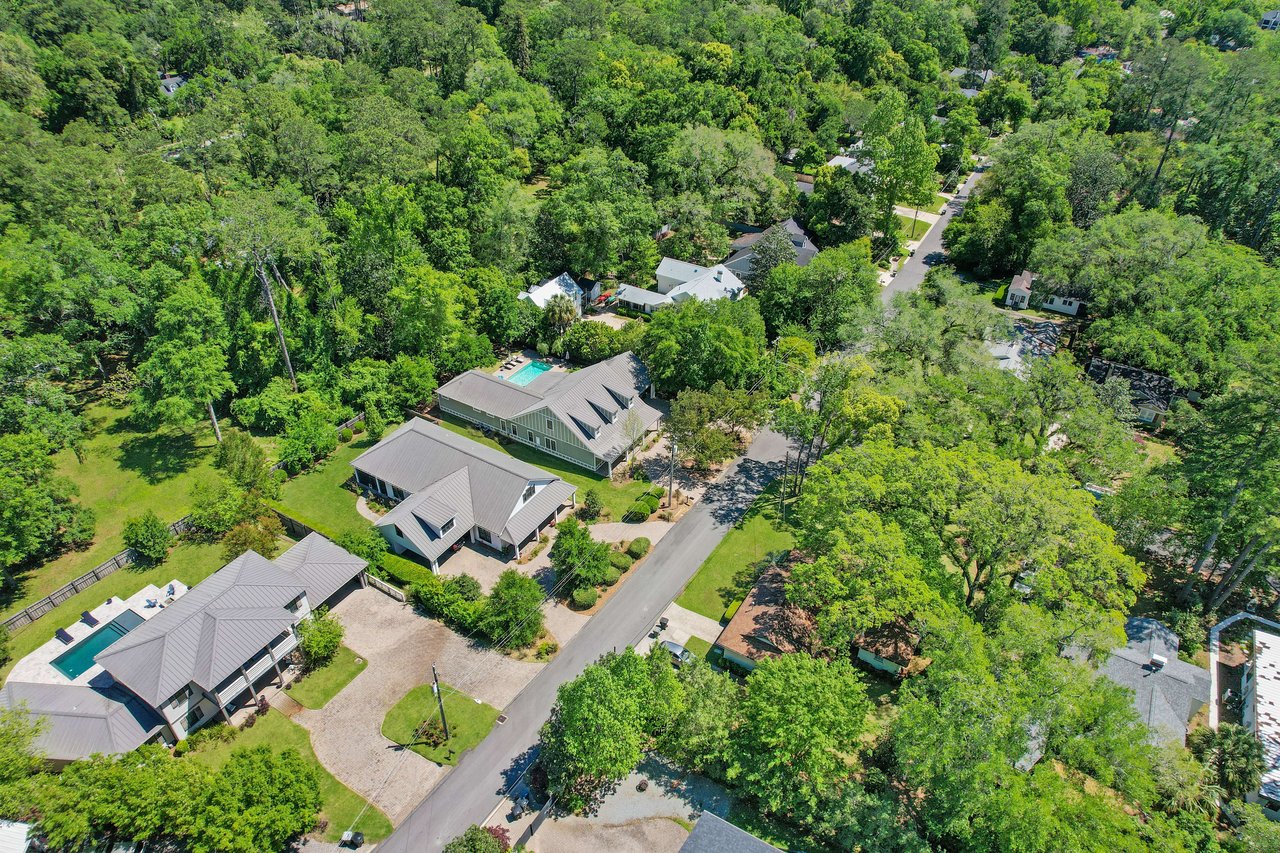 An aerial view of the Glendale neighborhood, showing houses, streets, and significant greenery.