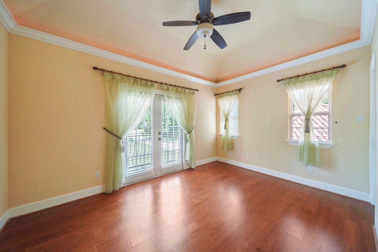 Secondary bedroom with Juliet balcony...ensuite bath and walk-in closet.