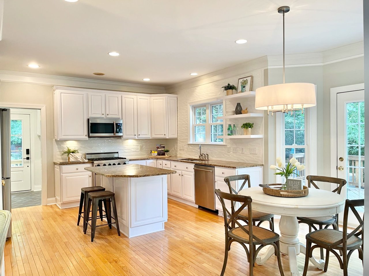 Kitchen with White Walls and Cabinets