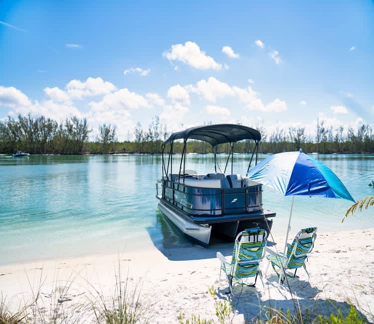 Boat rentals and marina lifestyle at Naples Bay Resort