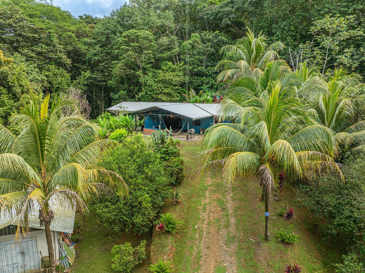 Tropical Hideaway – 7 Acres of Secluded Riverfront with a 3-Bedroom Home