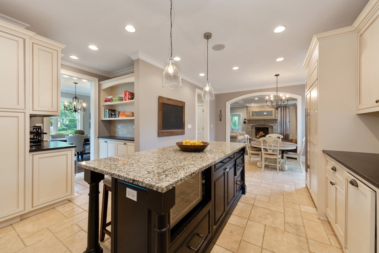 Timeless elegance meets transitional flair in builder's own award winning home