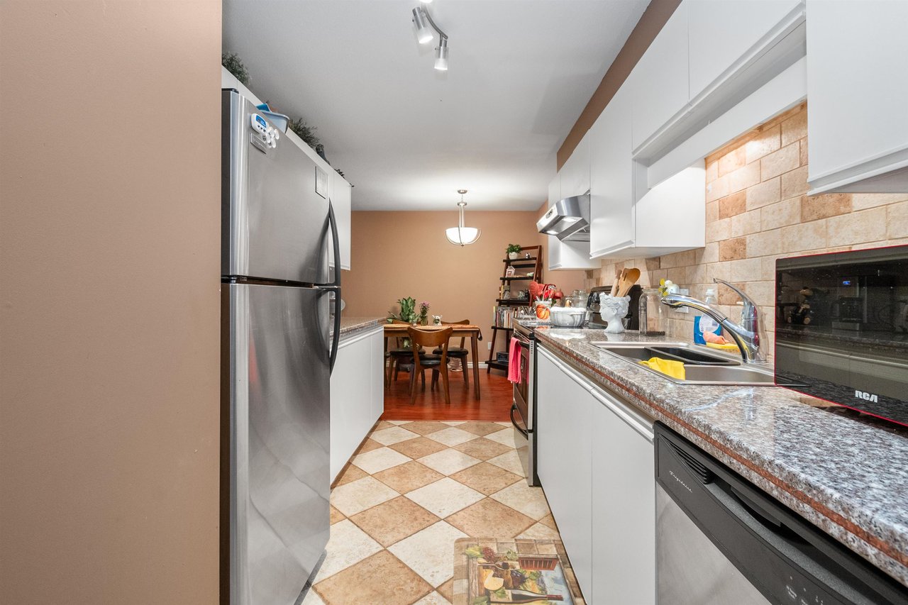 203-7694 Evans Rd