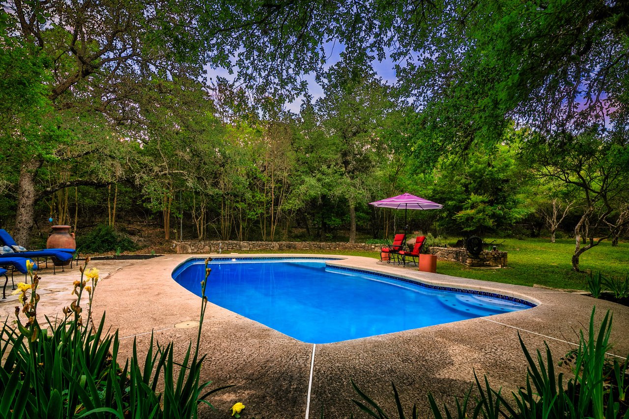 Updated, unrestricted Hillcountry Gem nestled in the Live Oak Trees