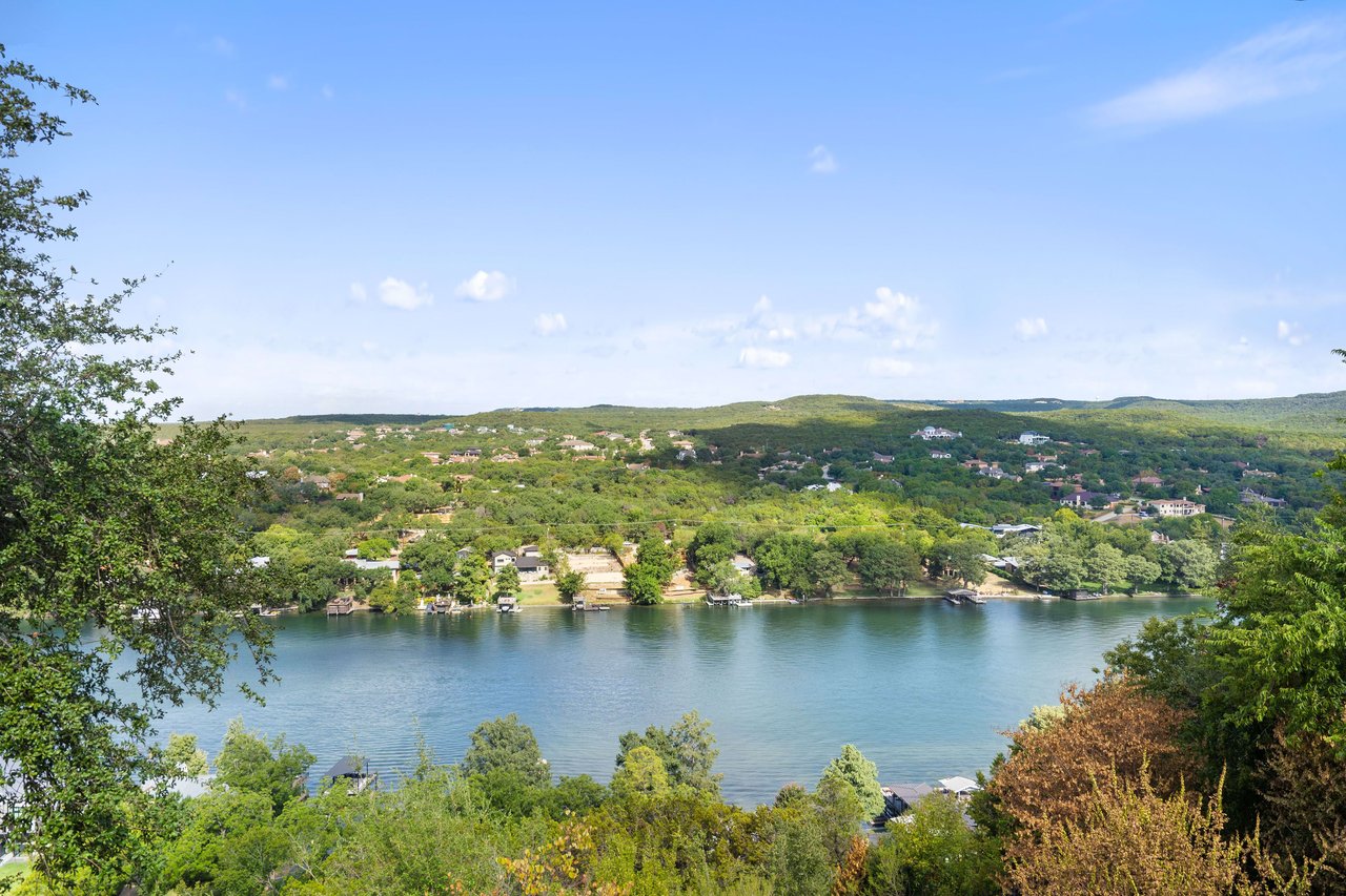 Lake Austin and Texas Hill Country views take center stage with their sweeping breathtaking natural beauty as seen from many rooms of this home designed to capture the pristine beauty .   The pristine landscape surrounded by majestic trees and water views will engage you endlessly as you enjoy your time at "The Legacy at Hunterwood Point"