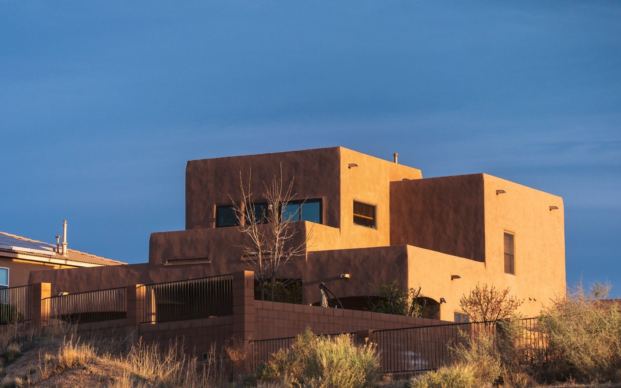 Santa Fe Style – Carved Wooden Doors, Exposed Natural Wood Vigas, Corbel, and Earth Tones