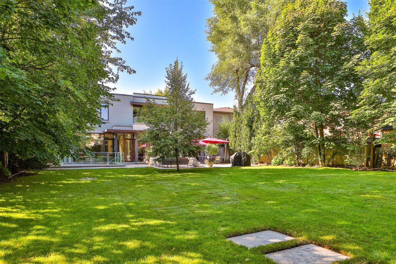 SOLD: Stunning and Sleek Design Built On Spectacular Lush Pie Shaped Lot