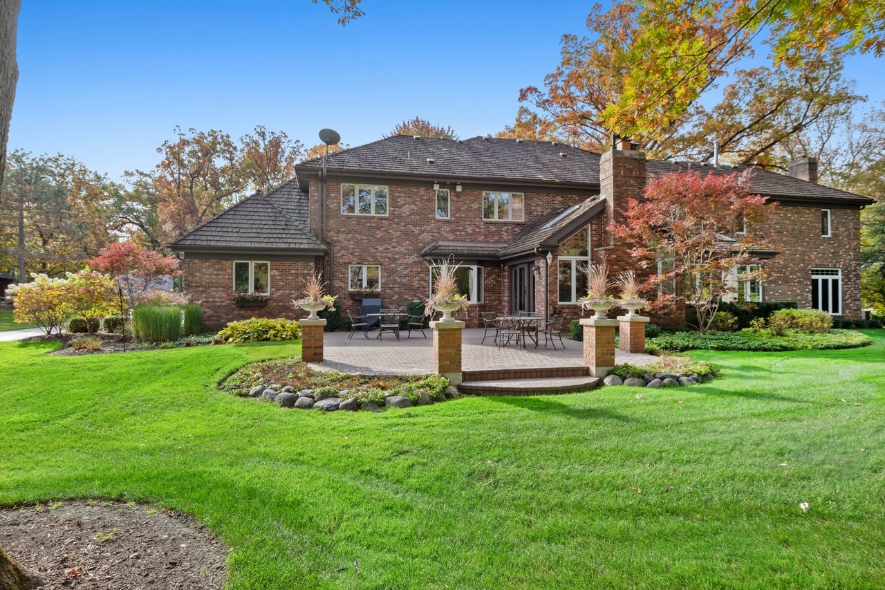 Beautifully Appointed Home in a Gated Community on Over an Acre of Professionally Landscaped Grounds with Pond Views