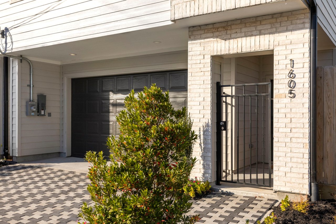 front door and driveway of a new home