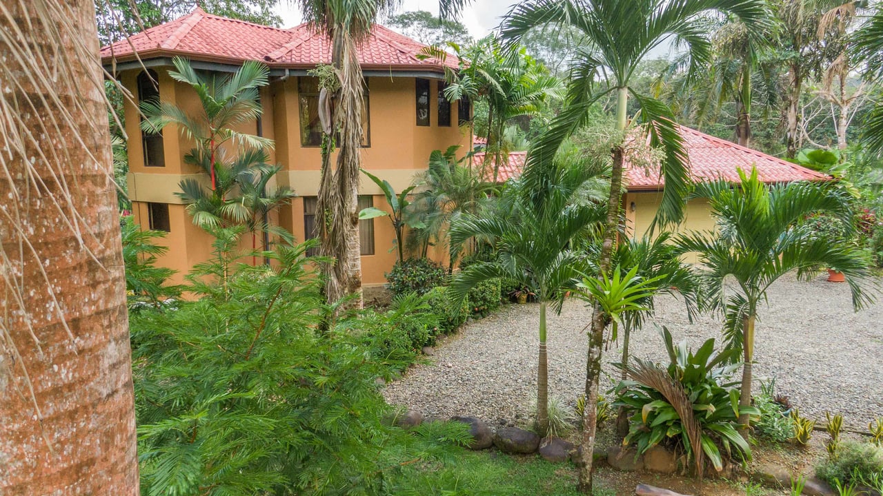 Stunning Tropical Home in Gated community with Hundreds of fruit trees  