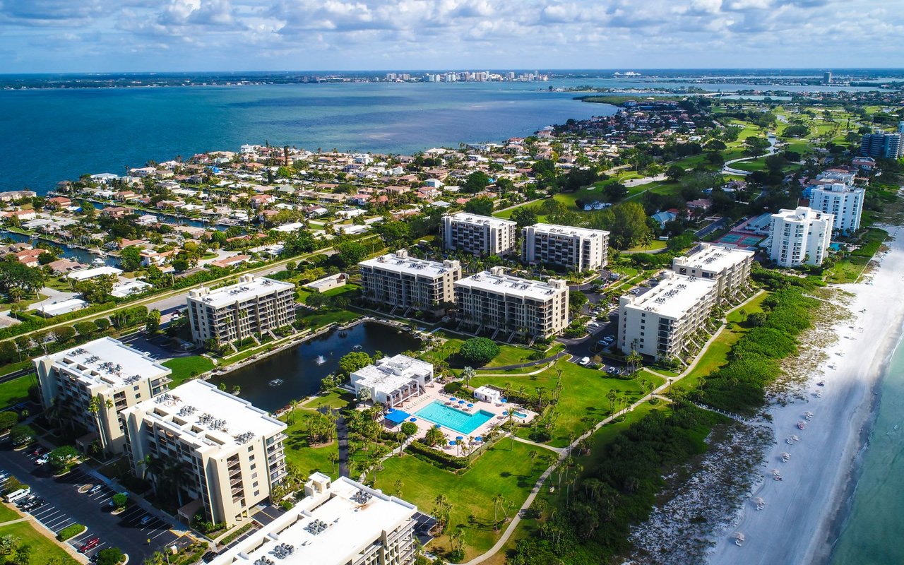 Southern Longboat Key featuring County Club Shores canal homes and Beachplace Condos