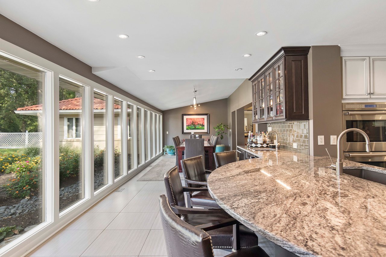 A Special Retreat on a Prized One Acre Lot With Pool and Tennis Court