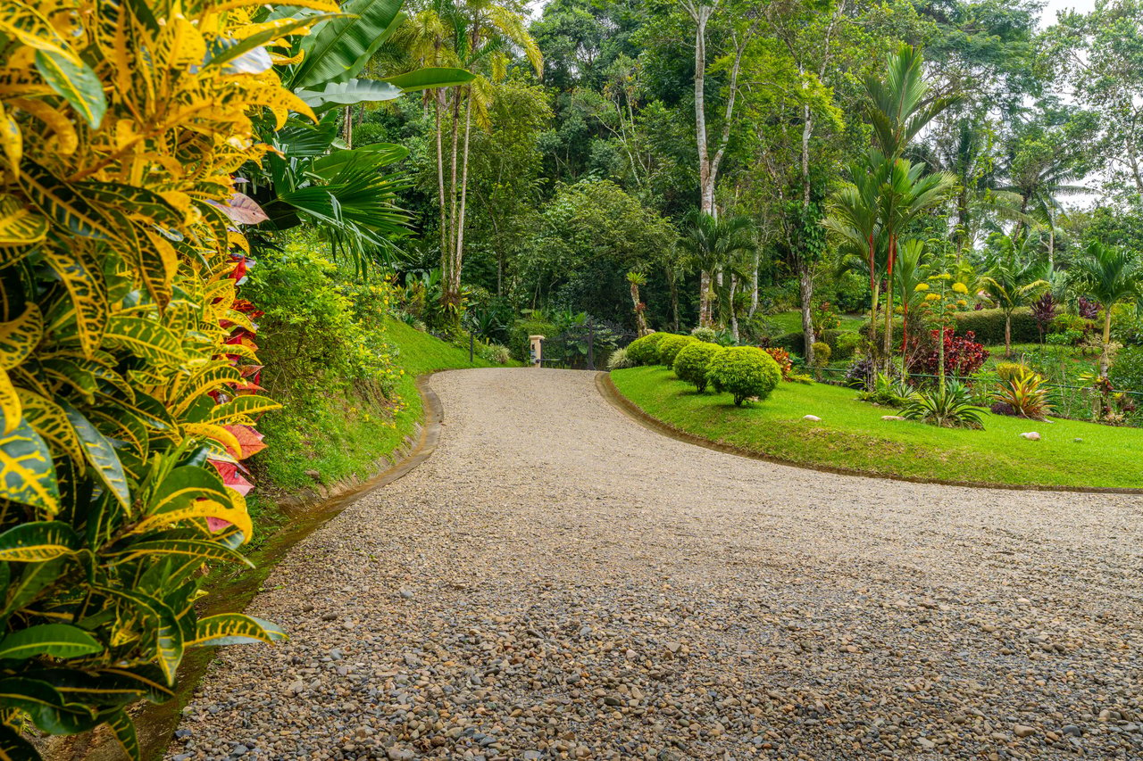 Beautiful 4500 sq ft home on 3.5 acres, gated community, expansive ocean, valley, and jungle views!