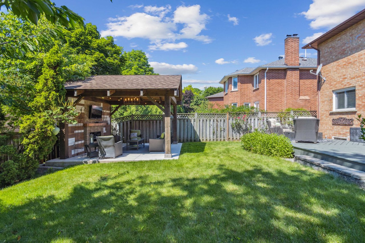 Updated Glen Abbey home with an Entertainers Backyard Paradise