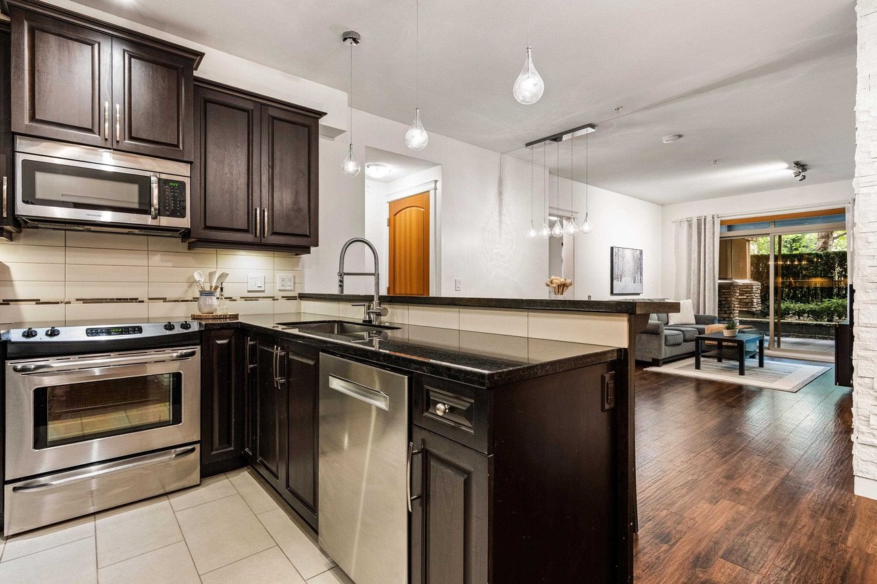 154-8328 207a St