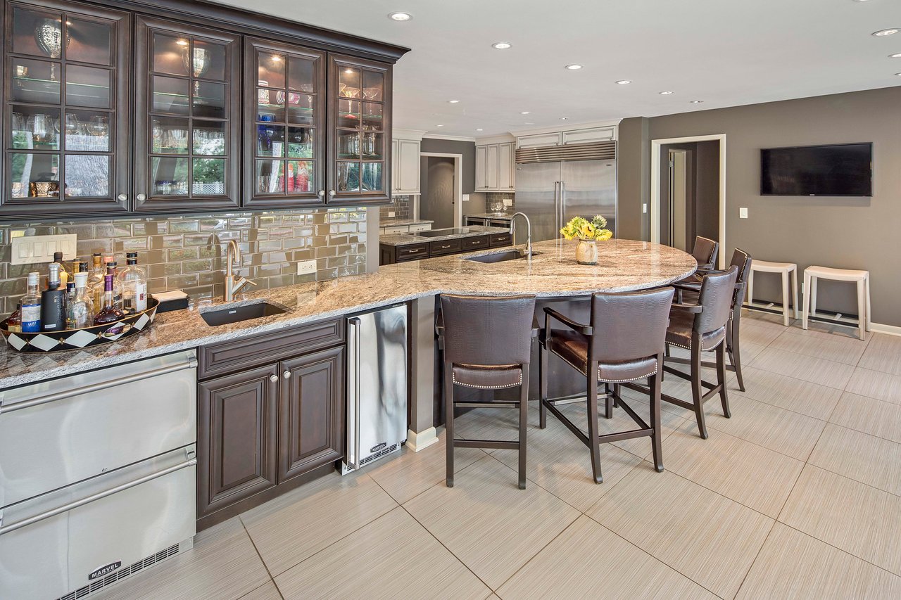 A Special Retreat on a Prized One Acre Lot With Pool and Tennis Court