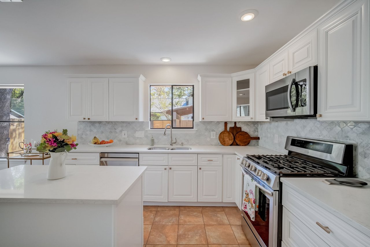 Charming Milwood Home: Updated Single-Story Gem with In-Law Plan & New Roof!