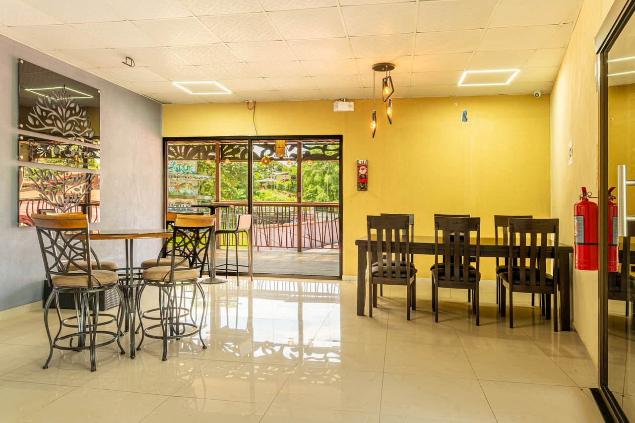 Two Profitable Businesses, 2- Two Bedroom Appartments, 8 Rental Units at its Premier Location..
