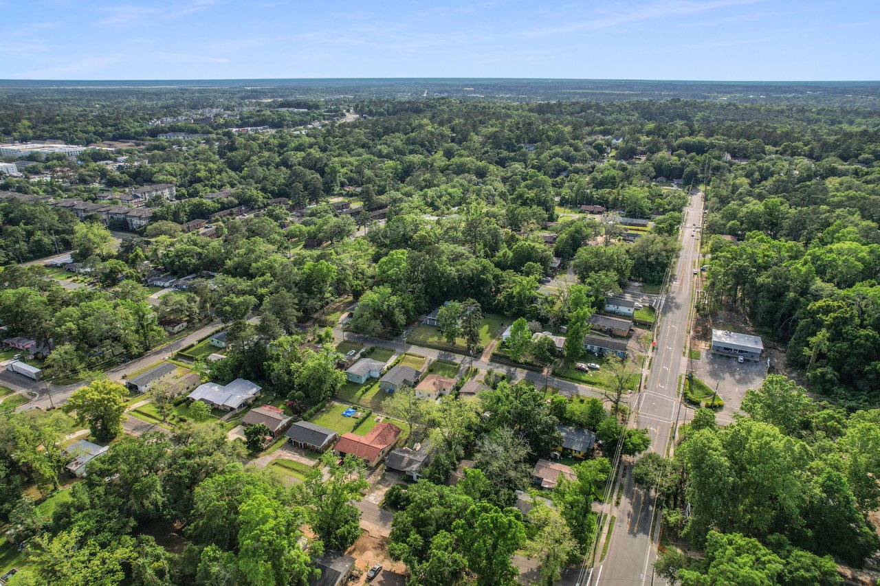 A broader aerial view of Griffin Heights, providing a wide perspective of the residential area and the extensive greenery.