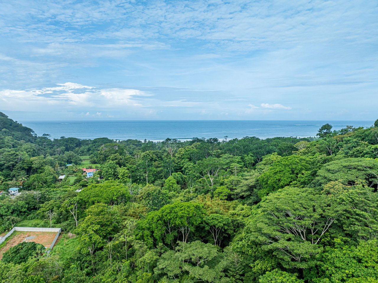 10-Acre Uvita Commercial Property with Existing Hotel & Highway Frontage – Development Potential Near the Beach