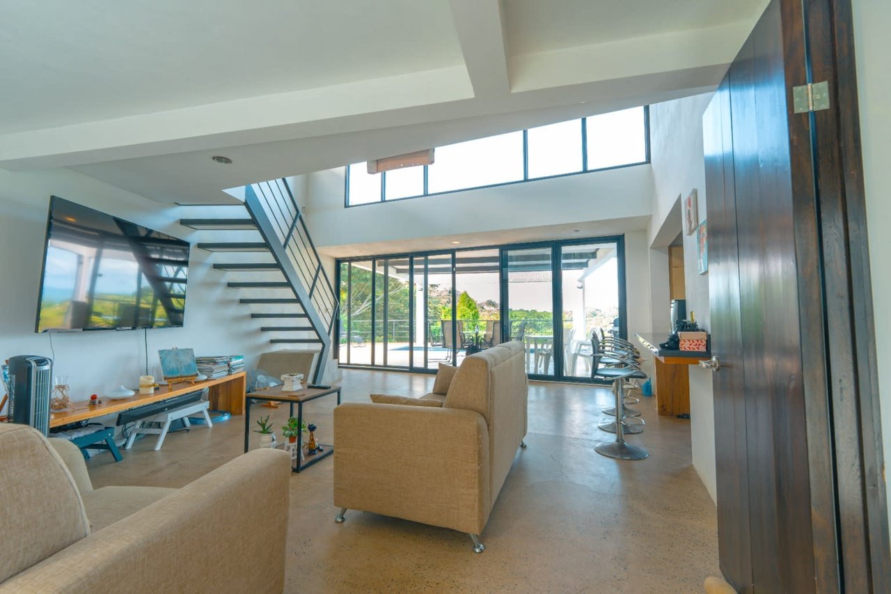 Stunning modern ocean view home, 3 bedroom, 3 bathroom on Calle Perezoso, Ojochal.