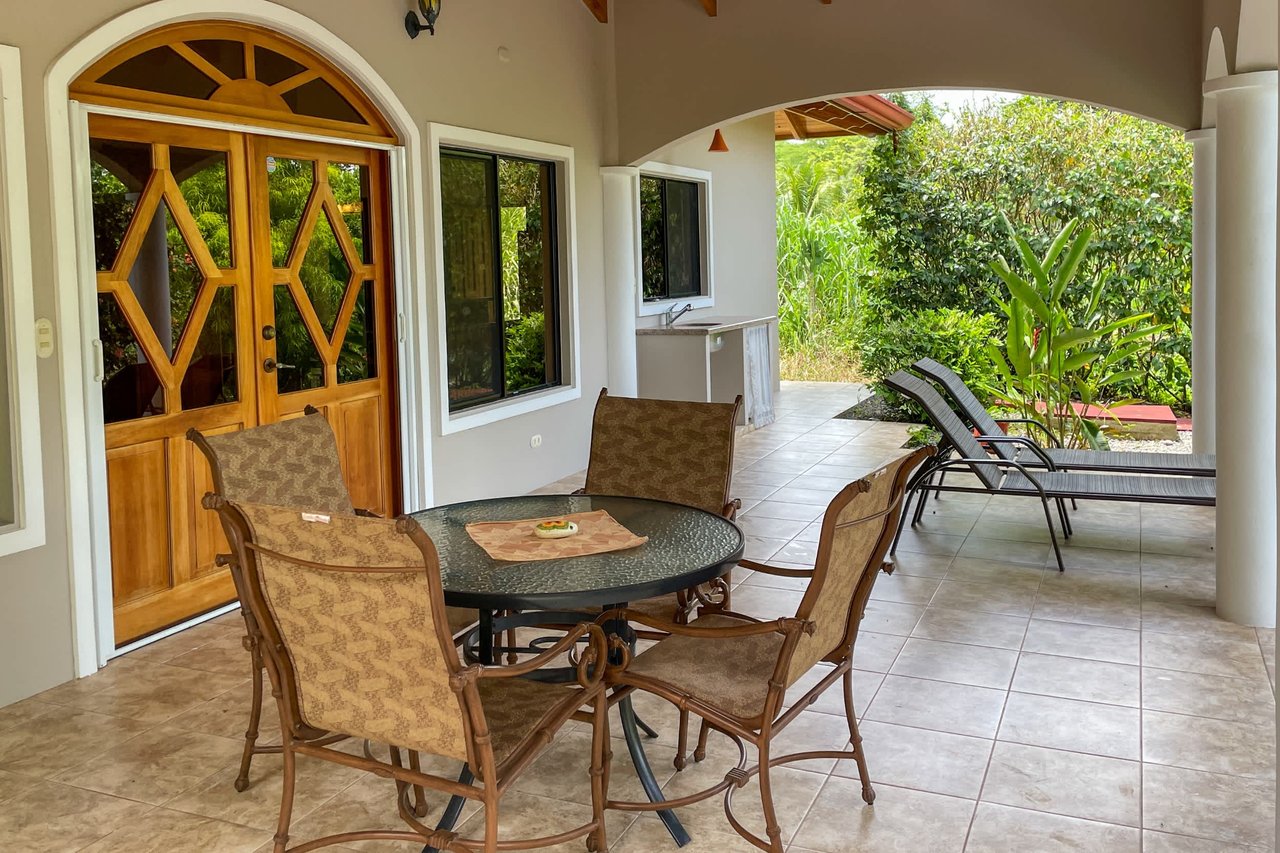 Turnkey Spacious Home with Open Layout, Pool & Small Ocean View in Ojochal Gated Community