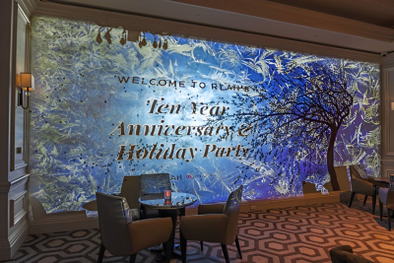 Rlah Properties celebrates 10 years in business with a holiday party.