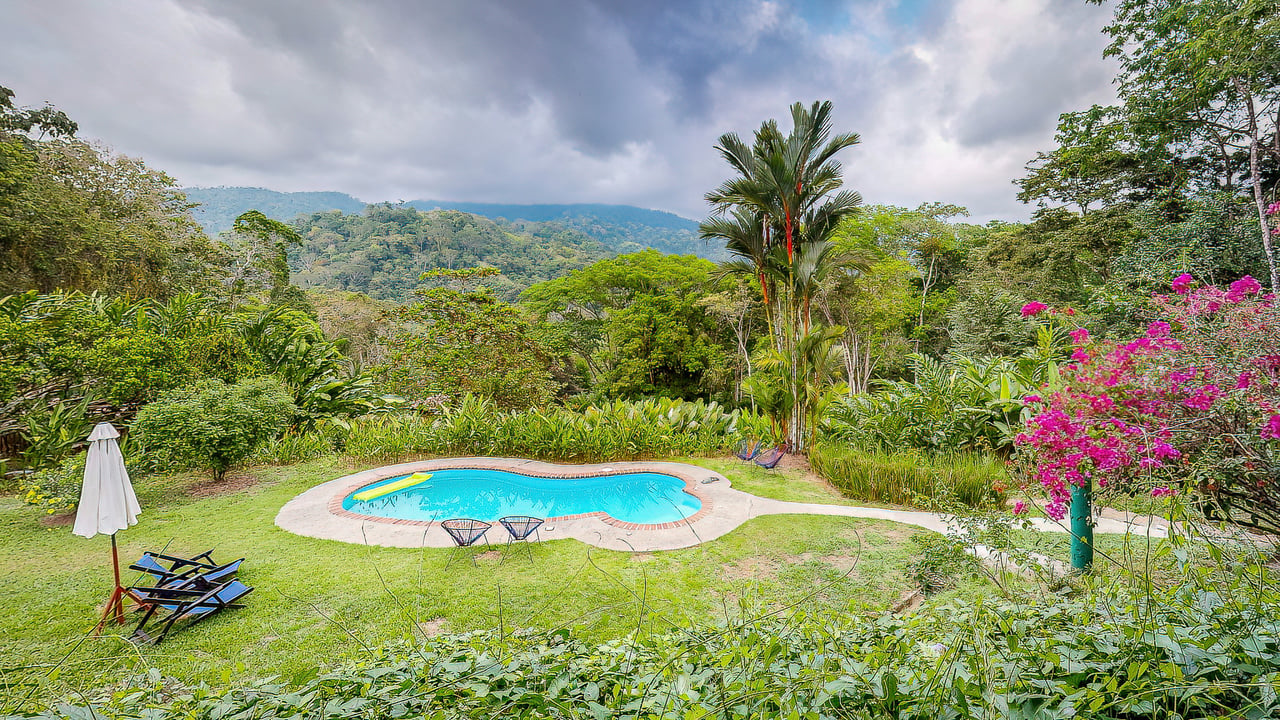 A Tranquil Haven: Prime Investment Opportunity in Uvita's Lush River Enclave