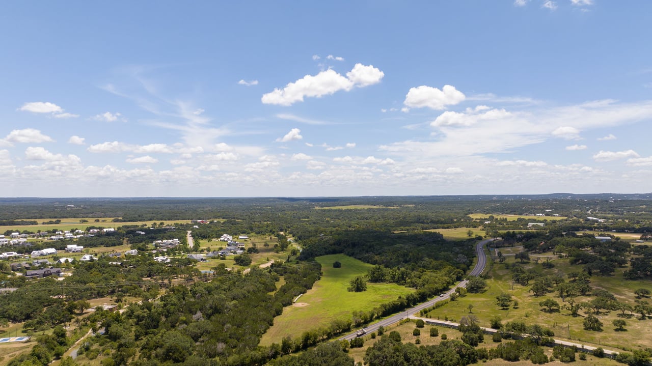 UNRESTRICTED ACREAGE WITH RANCH ROAD 12 FRONTAGE