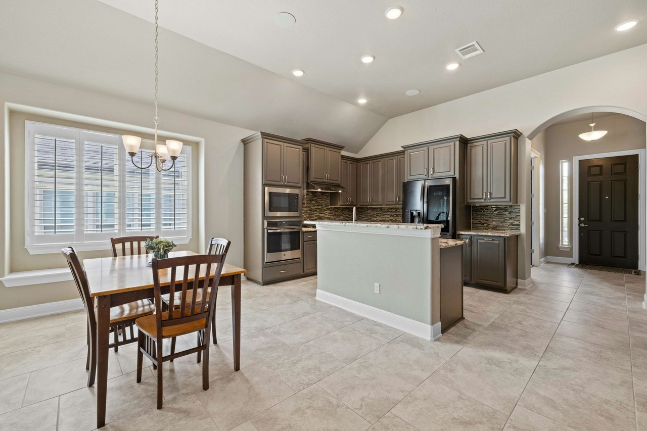 Impeccably Maintained 1-Story Taylor Morrison Home with Luxurious Amenities in Desirable Travisso Neighborhood!