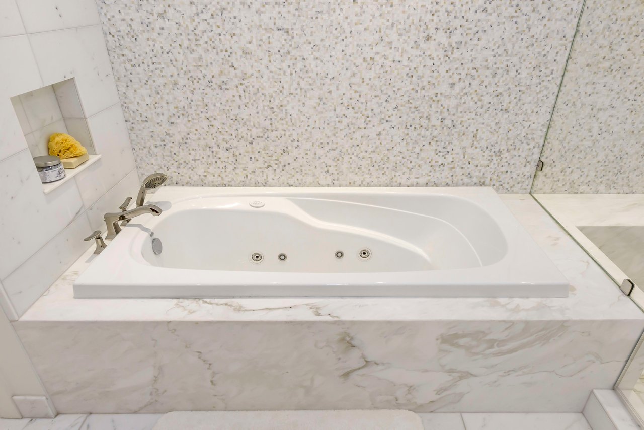 Impeccable Waterfront Lagoon Condominium- Represented Seller