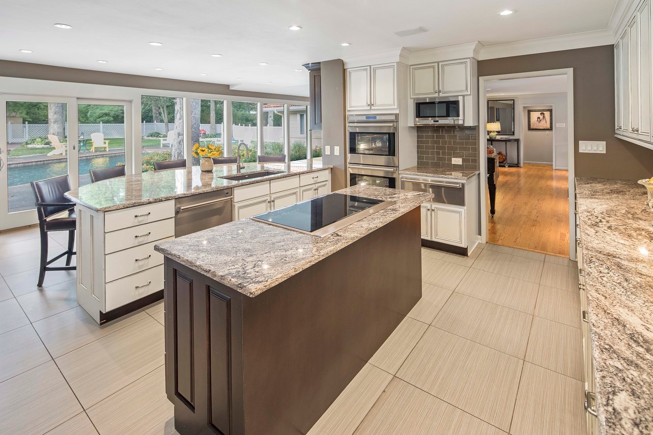 A Special Retreat on a Prized One Acre Lot With Pool and Tennis Court