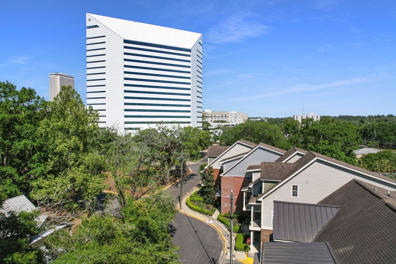 An aerial view of the All Saints area, highlighting a large building (possibly a landmark) surrounded by smaller residential buildings and green spaces.