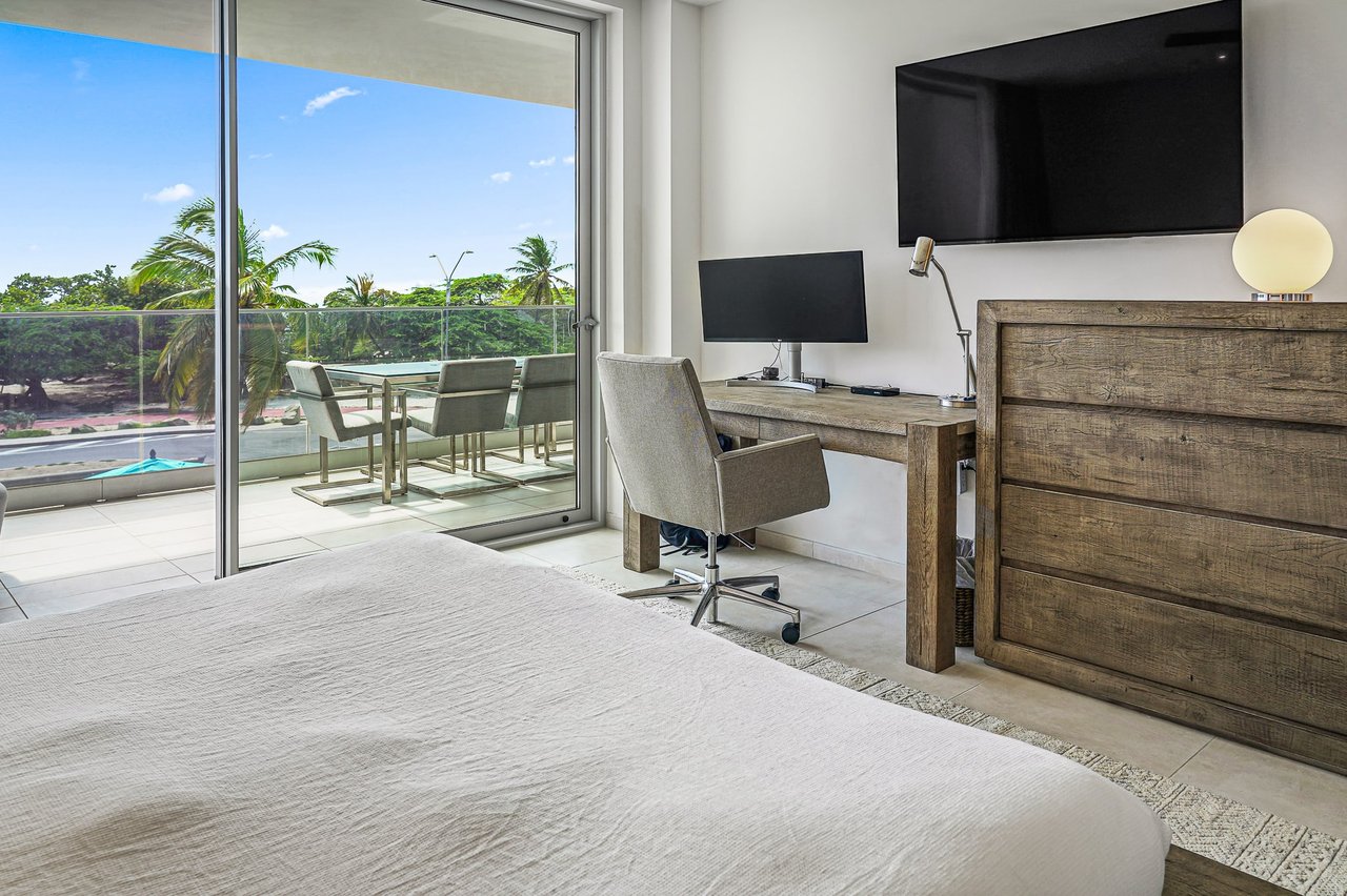 Discover Serene Luxury at O Condominium Aruba's Unit 13