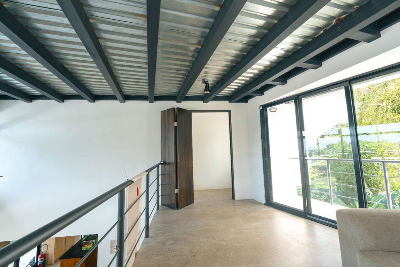 Stunning modern ocean view home, 3 bedroom, 3 bathroom on Calle Perezoso, Ojochal.