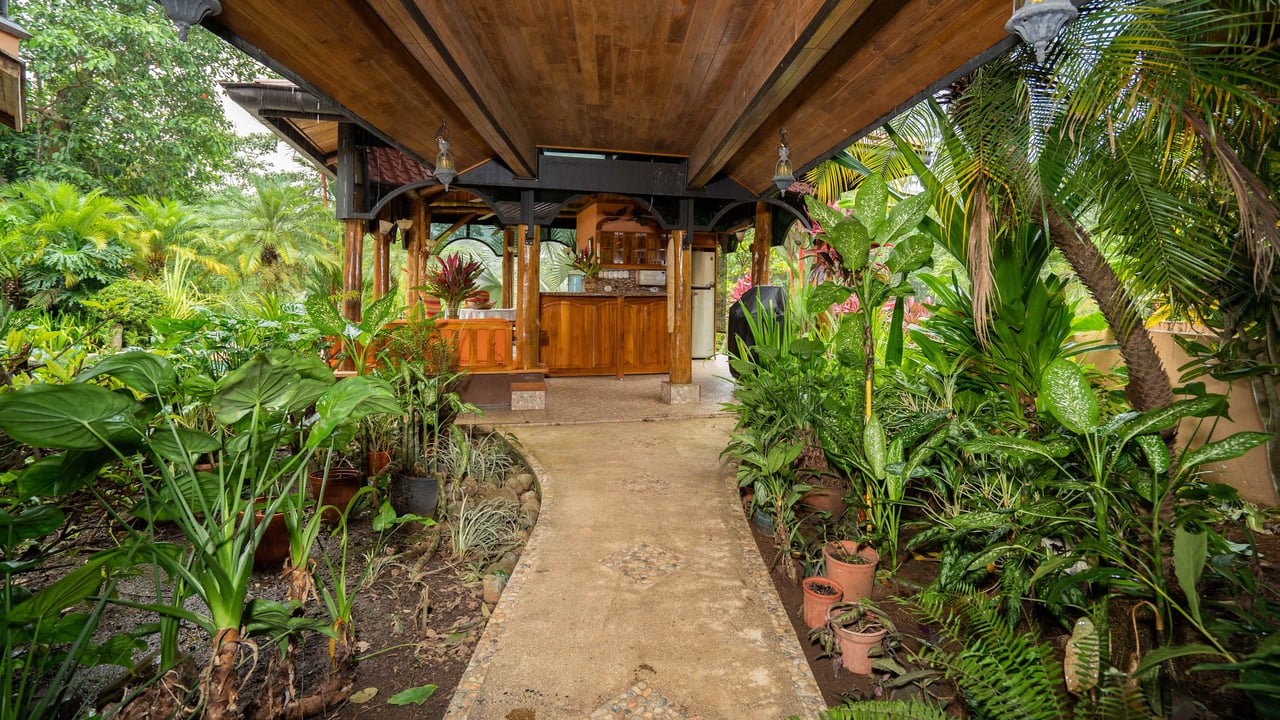 Stunning Tropical Home in Gated community with Hundreds of fruit trees  