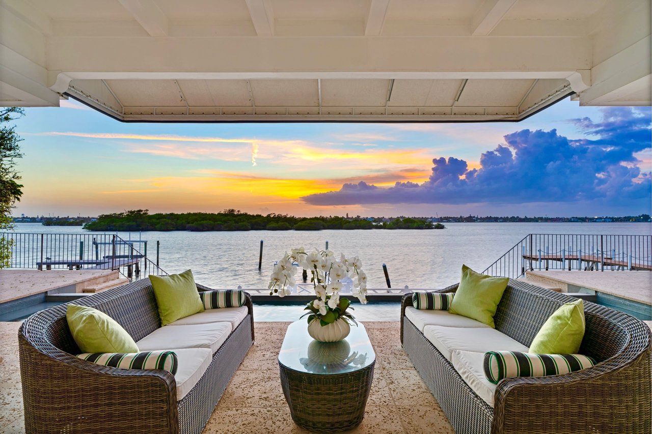 Loggia overlooking pool on the palm beach intracoastal with sunset views