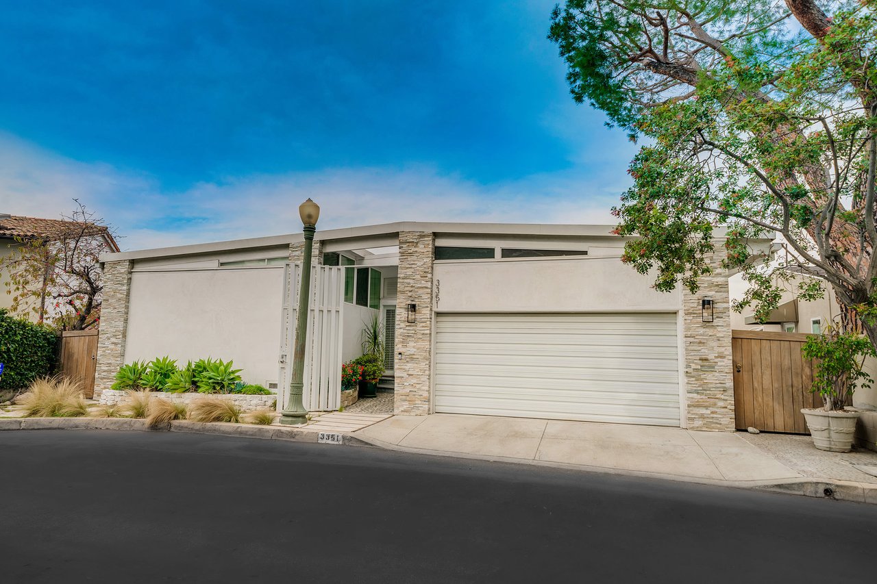 Mid Century with Potential in Lovely Lake Hollywood