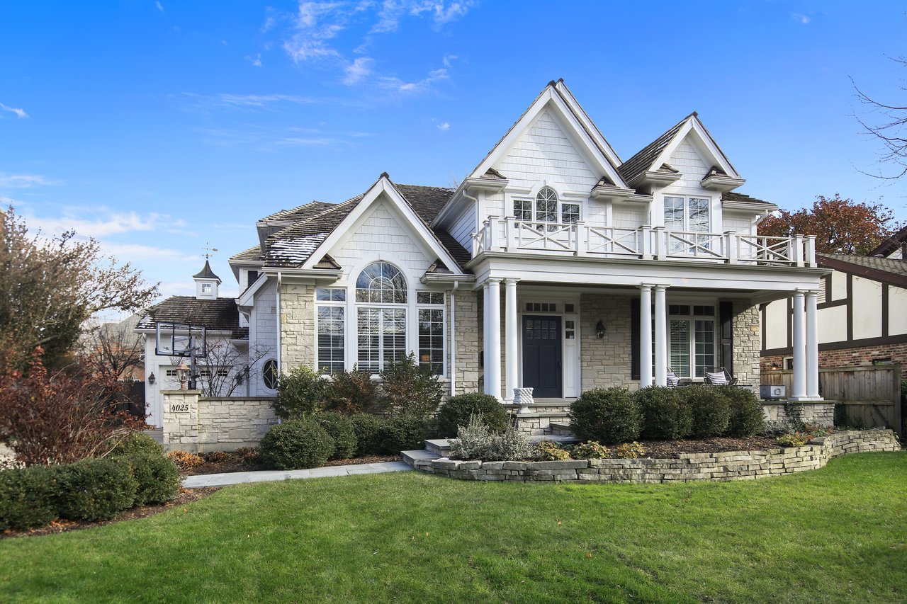 The Tree-lined Street And A Perfectly Manicured Yard Welcome You To The Entry Of The Home