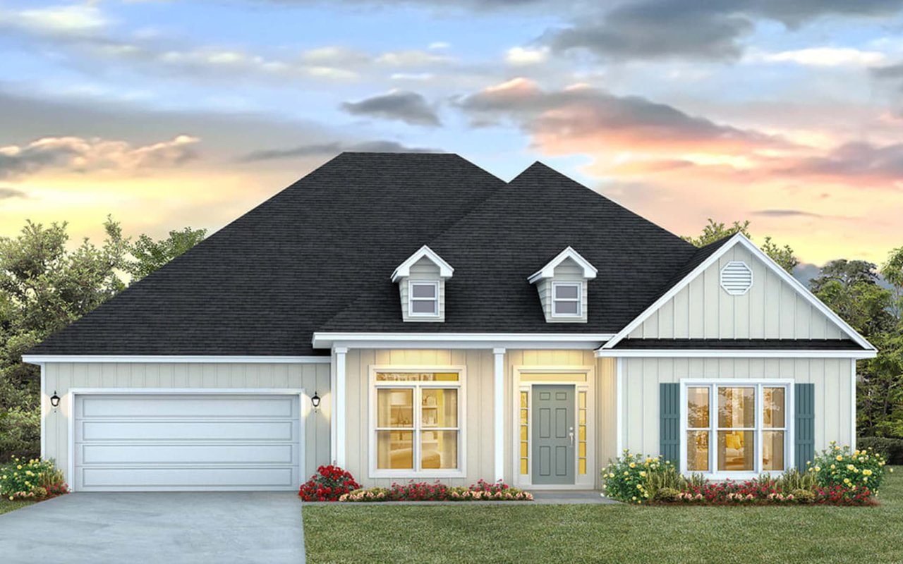 A one-story, beige-colored house with a dark gray roof.