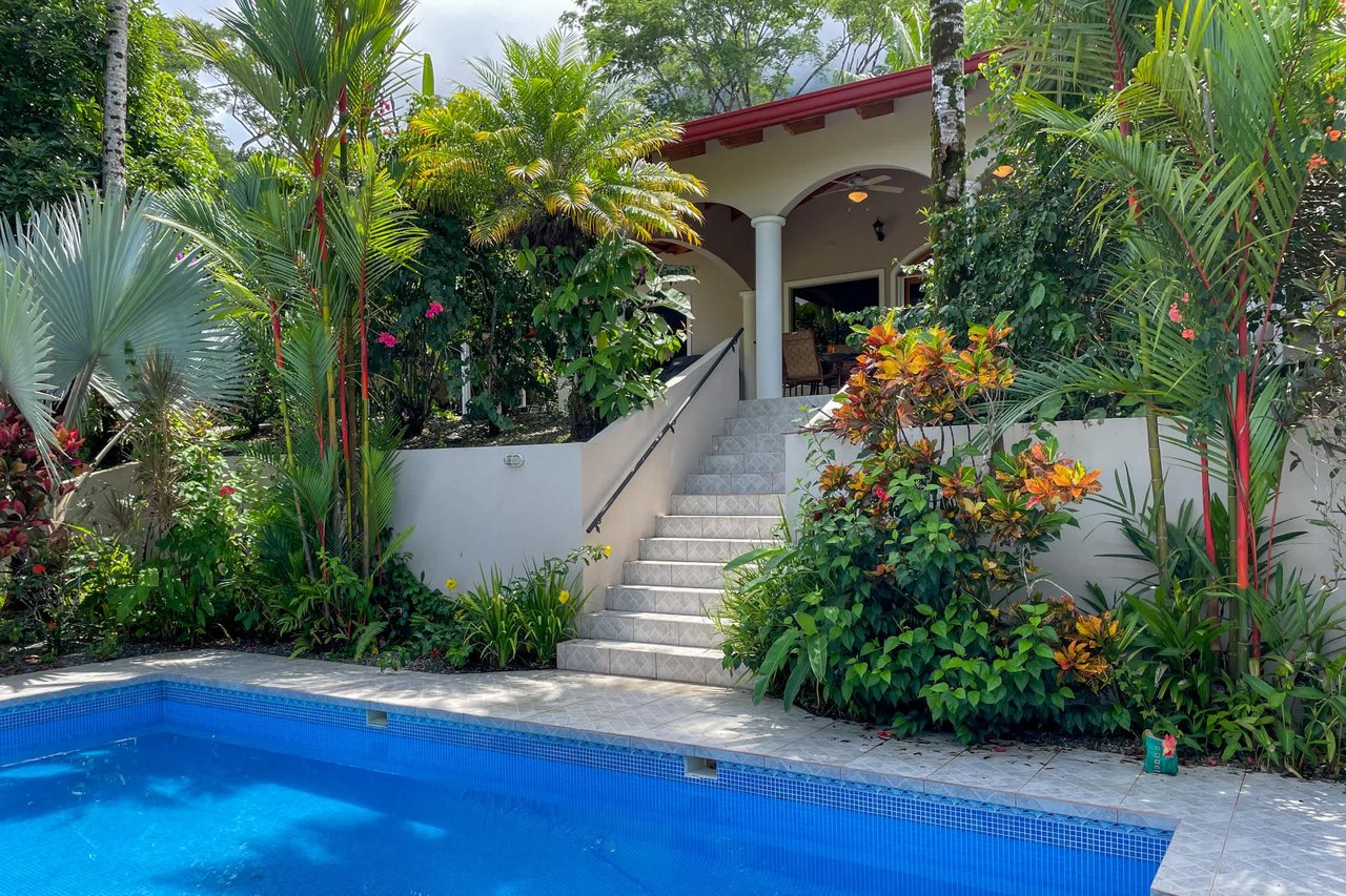 Turnkey Spacious Home with Open Layout, Pool & Small Ocean View in Ojochal Gated Community