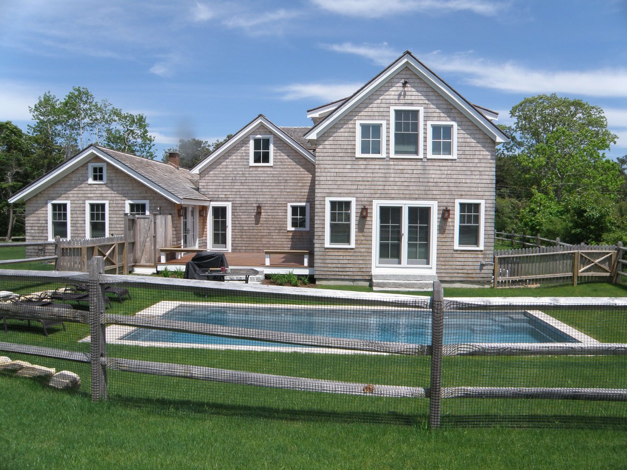 Modern Katama Farmhouse with Pool and Barn