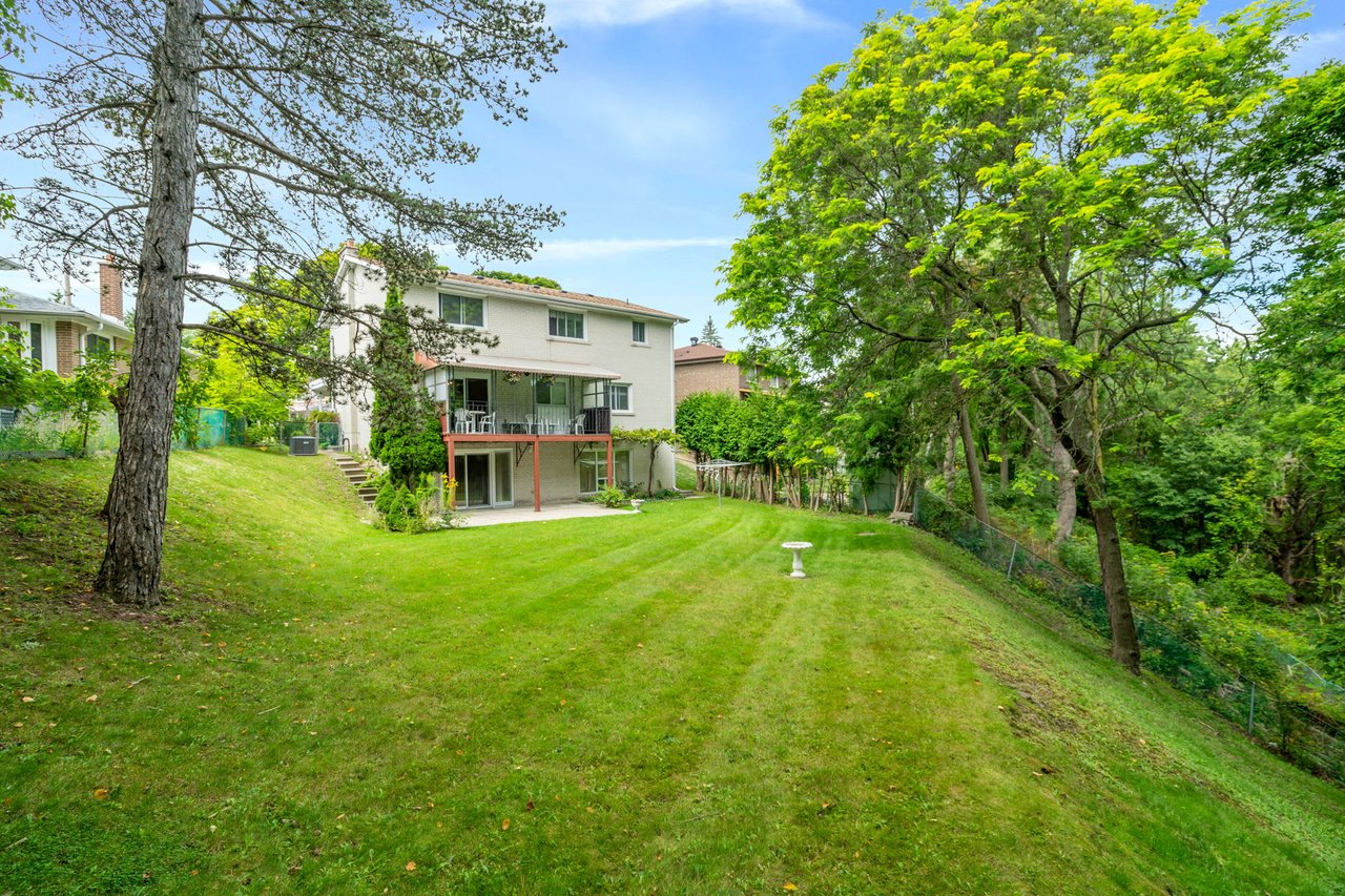 SOLD: Coveted Bayview Woods