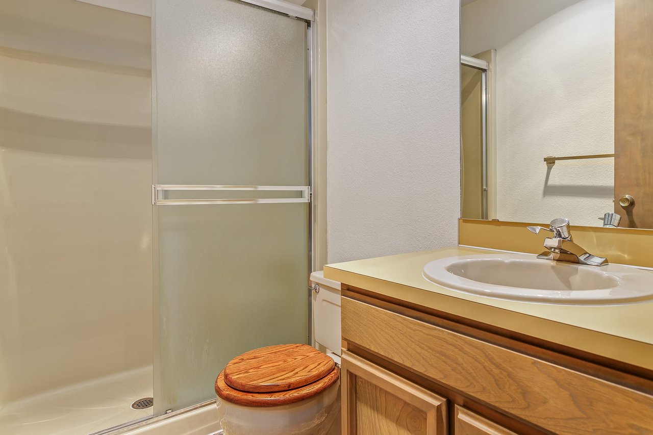 Experience convenience with a full bath conveniently located on the main living area, offering practicality and ease for you and your guests.