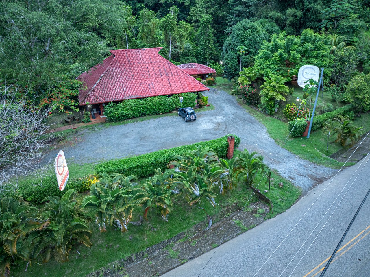 10-Acre Uvita Commercial Property with Existing Hotel & Highway Frontage – Development Potential Near the Beach