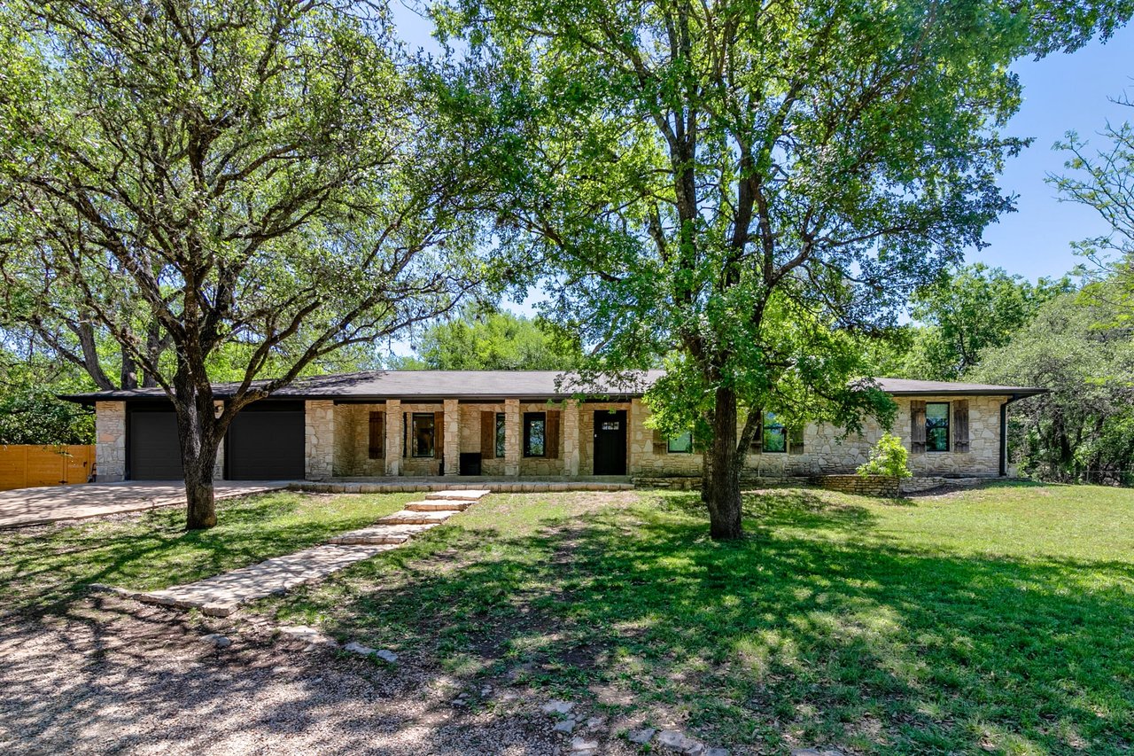 Updated, unrestricted Hillcountry Gem nestled in the Live Oak Trees