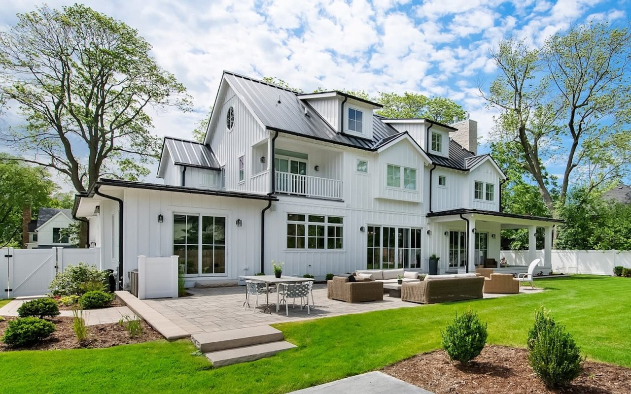 a large white house with lots of windows