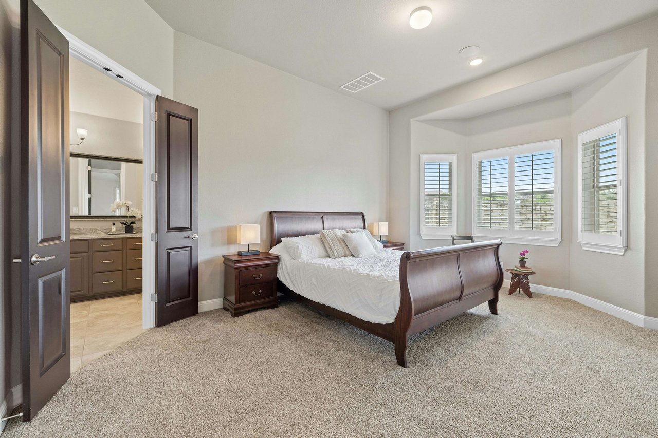 Impeccably Maintained 1-Story Taylor Morrison Home with Luxurious Amenities in Desirable Travisso Neighborhood!