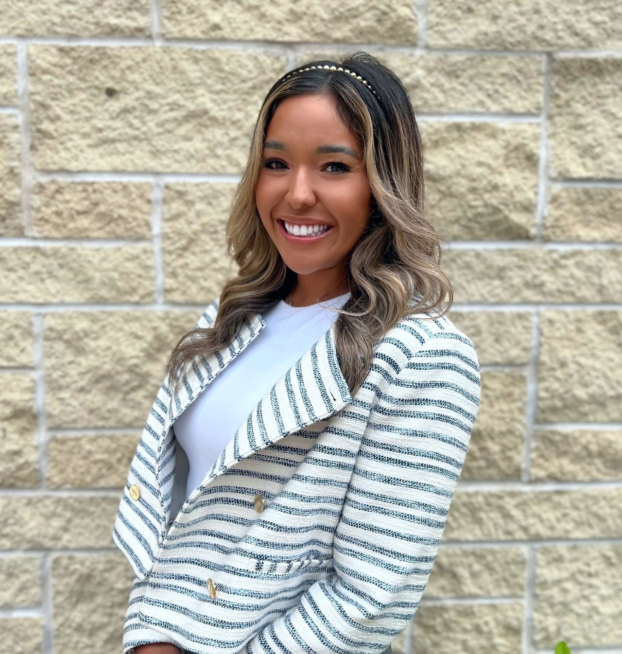 a profile photo of realtor Kennedi Ledesma