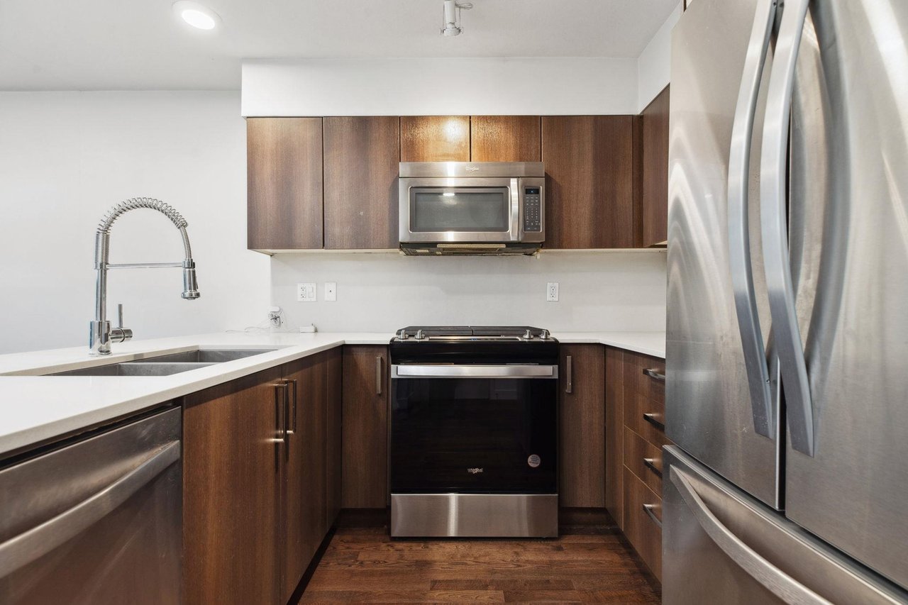 107-7088 14th Ave